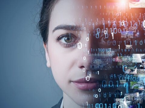 A woman's face surrounded by computer code